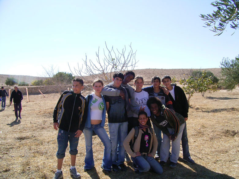 Nitzana farm maintenance project with students includes overturning of the soil, getting rid of bushes and brush, cleaning up the area, and planting.  These kids at Nitzana High School are having fun, while taking care of their historic environment.