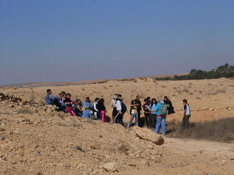 Nitzana farm maintenance project with students includes overturning of the soil, getting rid of bushes and brush, cleaning up the area, and planting.  These kids at Nitzana High School are having fun, while taking care of their historic environment.