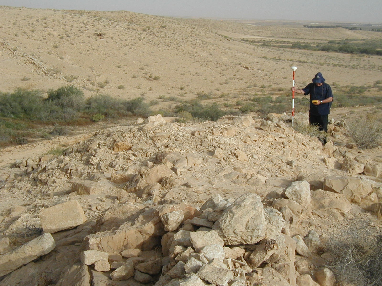 Nitzana Archaeological Survey: Ruins of a farmhouse from the Byzantine Period (5-7th Centuries C. E.) watching the agricultural terraces below.